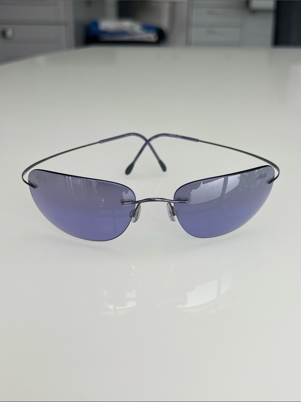 Silhouette Rimless Men's Sunglasses with Violet Lenses